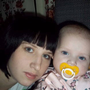 Аксиния Курмаз