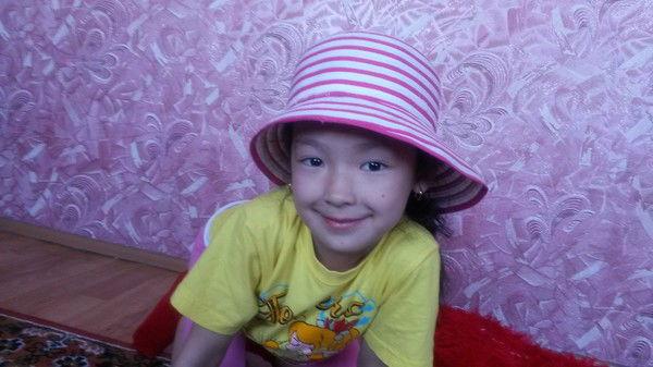 Алма Исенова