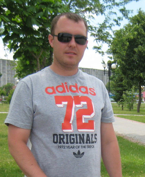 Александр Голик