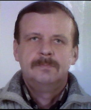 Роман Кинах