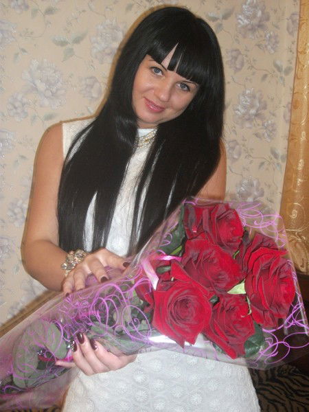 Нелли Холматова