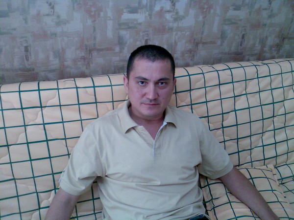 Алишер Холматов