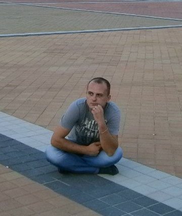 Максим Полищук