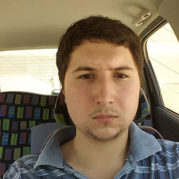 Алишер Рискиев