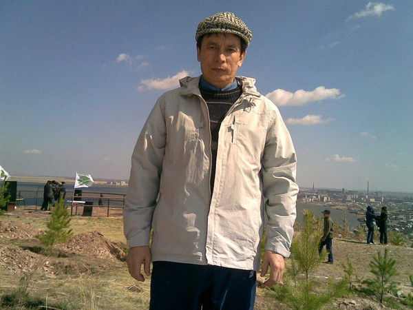 Риза Жунусов