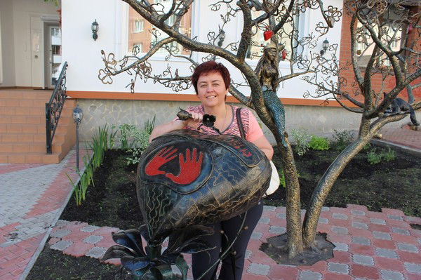 Белла Романютенко