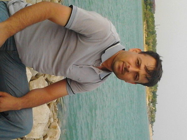 Курбонали Далатов