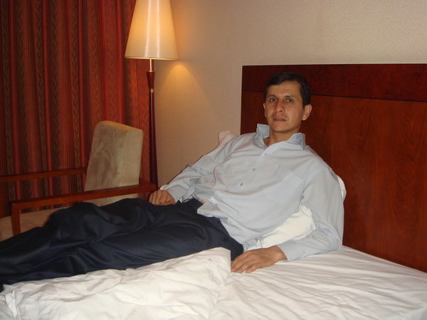 Алишер Шаропов