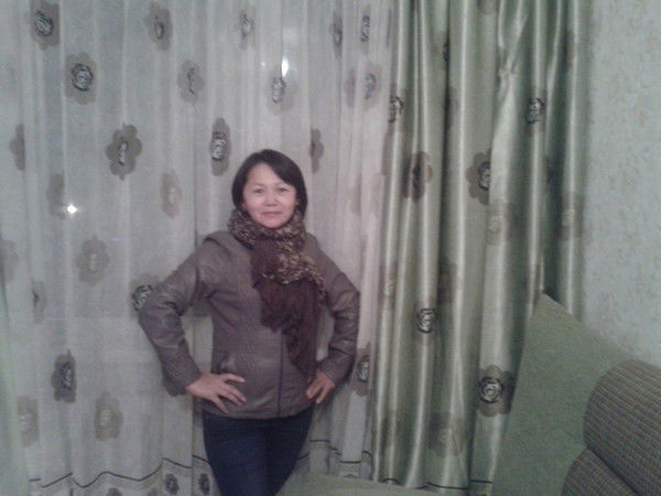 Айна Жугинисова