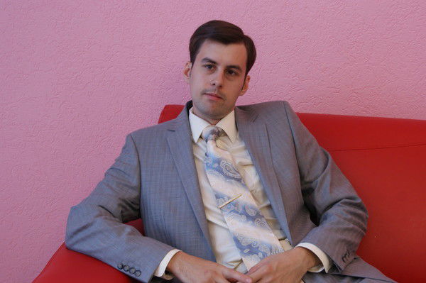 Роман Конов