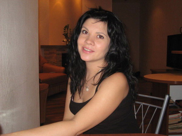 Eлена Mинина