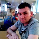 Денис Служаев