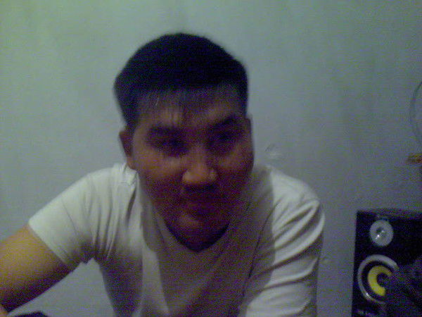 Женис Купеев