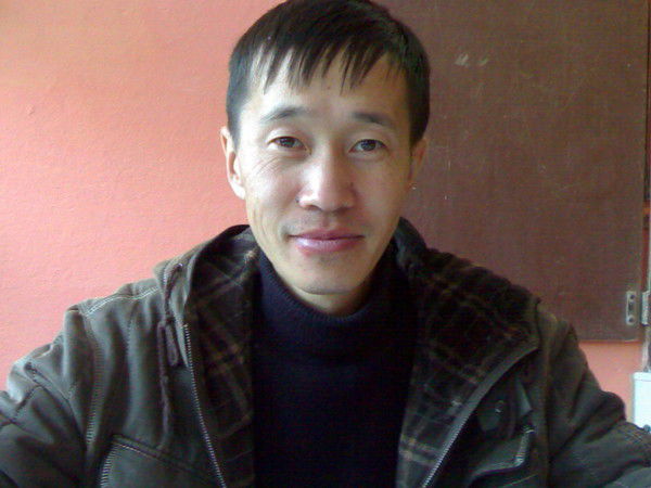 Еркен Амангельдин