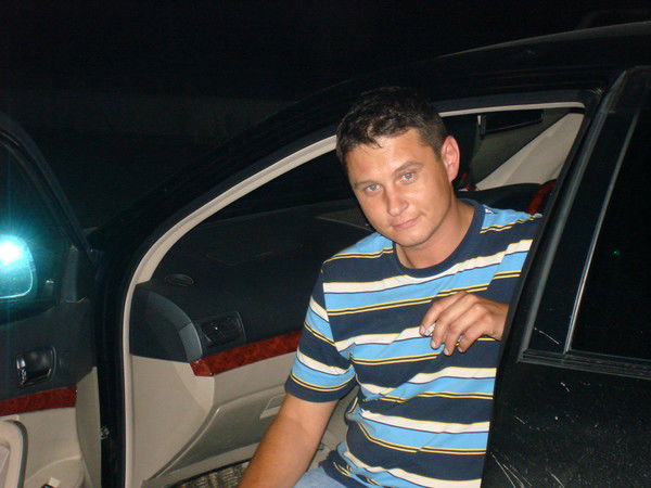 Максим Холощак