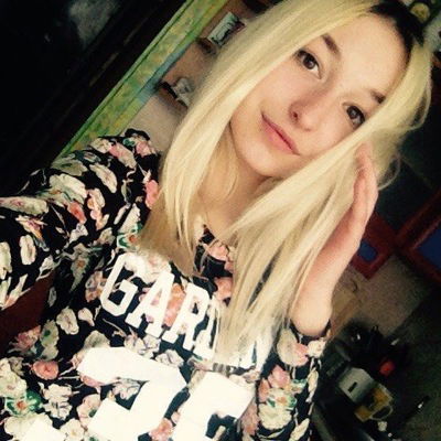 Оля Тюкалова