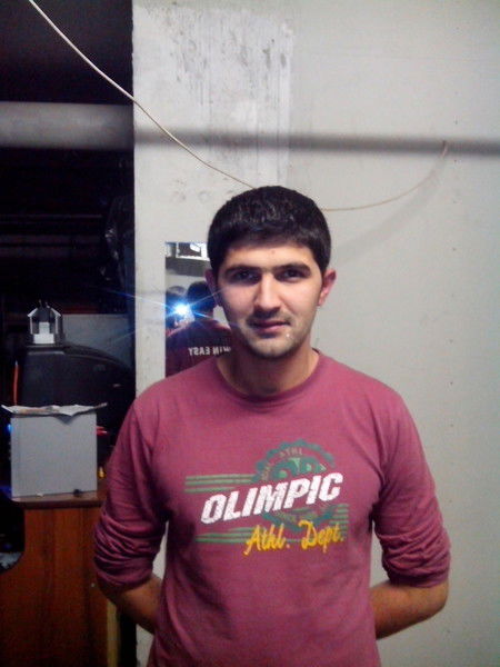 Алишер Шарипов