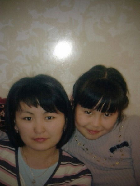 Cания Eрболатoва