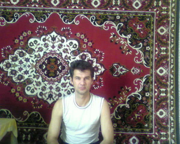 Алишер Норбутаев