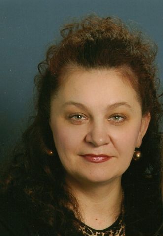 Оля Сотникова