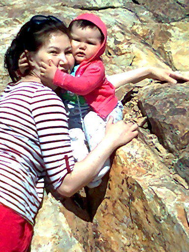 Бинур Узалина