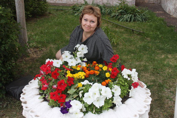 Оля Плотникова