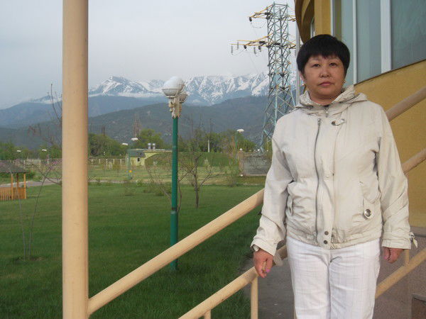 Алма Байгазинова