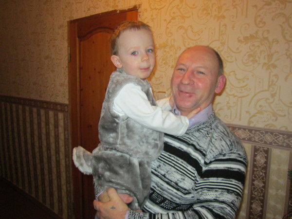 Александр Белан