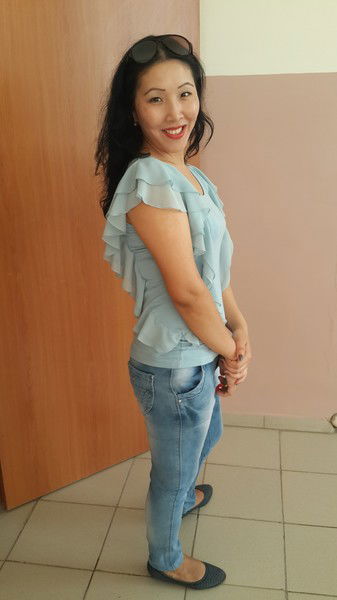 Айгуля Искакова