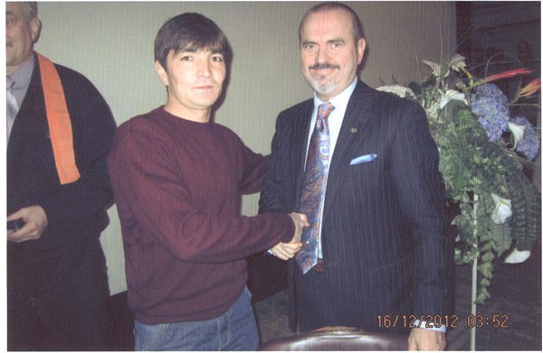 Аман Искаков