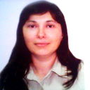 Анна Комур
