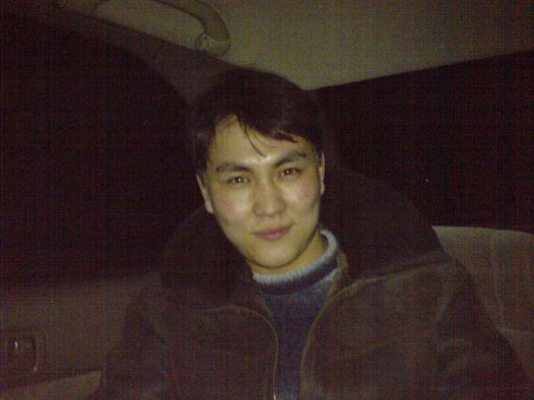 Роман Котожеков