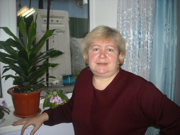 Мария Комур