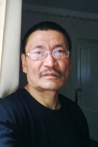 Николай Тен