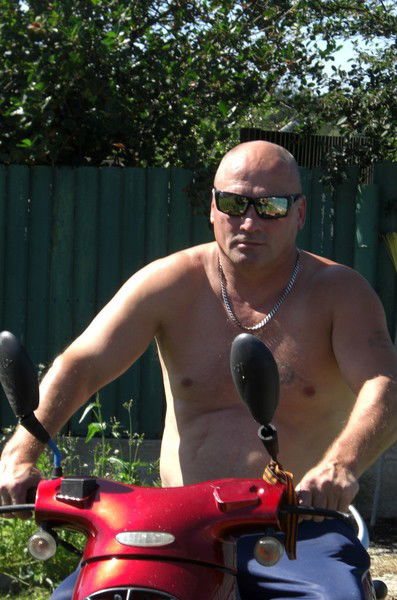 Олег Томилин