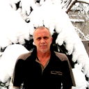 Александр Исаев