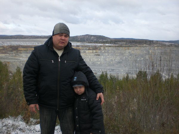 Роман Талья