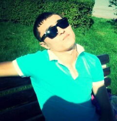 Риза Искаков