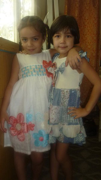 Камила Холматова