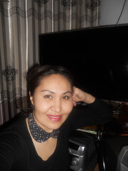 Алма Мамина