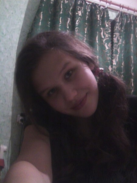 Оля Тихонова