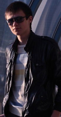 Максим Белый