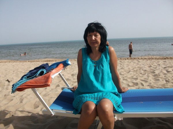 Камила Усенова