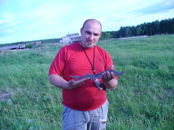 Олег Белозерцев