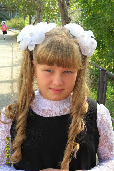 Оля Потапова