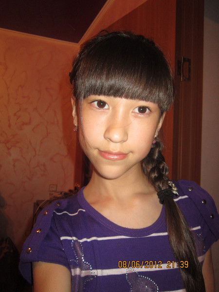 Анель Толеуханова