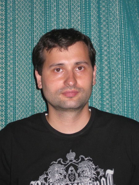 Евгений Чекарамит