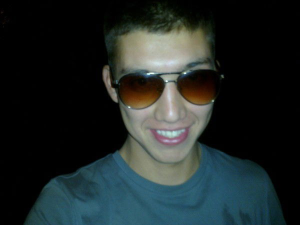 Алишер Садыков