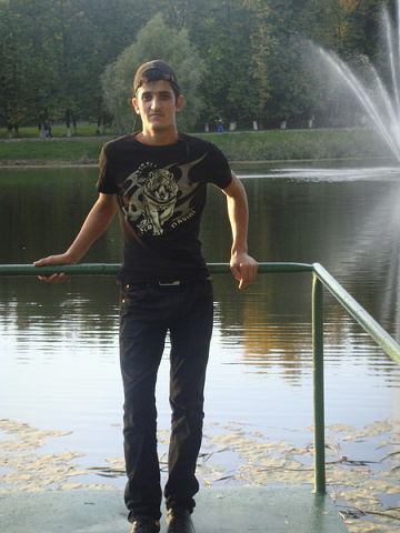 Али Холиков