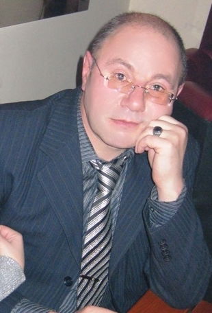 Олег Кузнецов